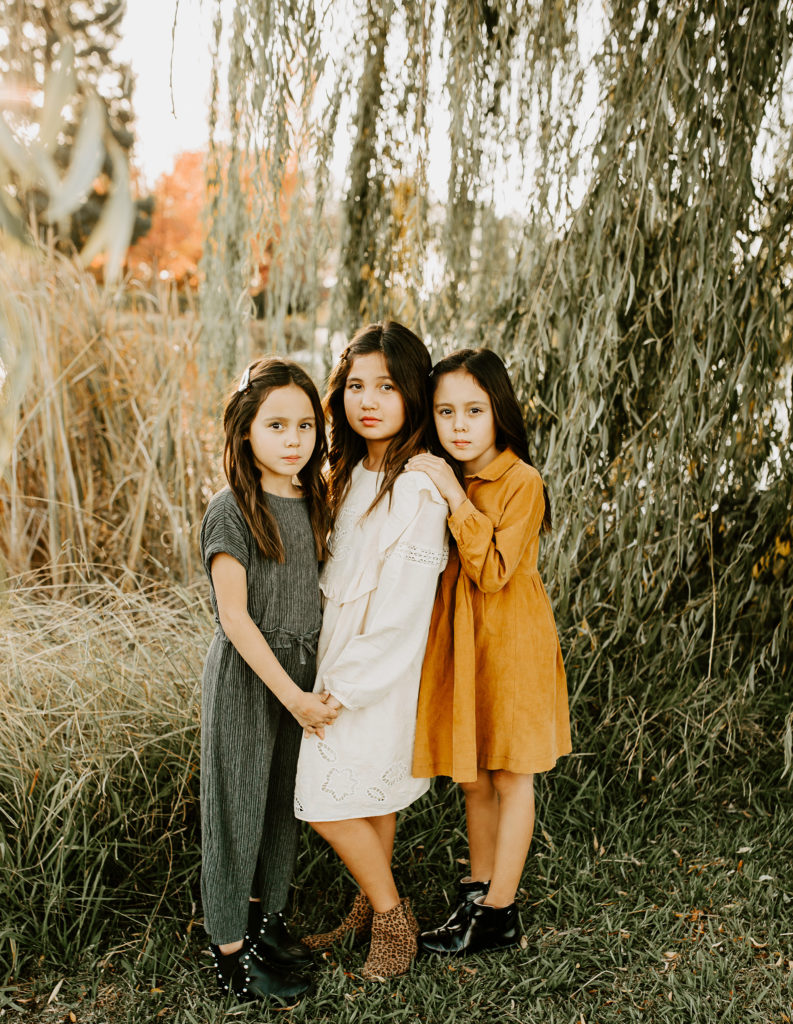 group-of-3-sisters-in-the-woods